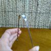 Raspador de língua em aço inoxidável (slim) fabricado na Índia com 1 saquinho