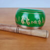 Tigela tibetana com 7 ligas de metal 10cm verde e dourada