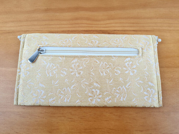 Bolsa indiana clutch retrô de tecido sem alça amarelo e dourado