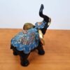 Elefante indiano de madeira com incrustações douradas 20 cm