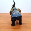 Elefante indiano de madeira com incrustações douradas 20 cm