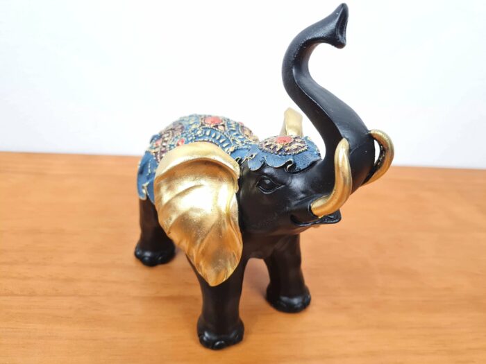Elefante indiano de madeira com incrustações douradas 20 cm