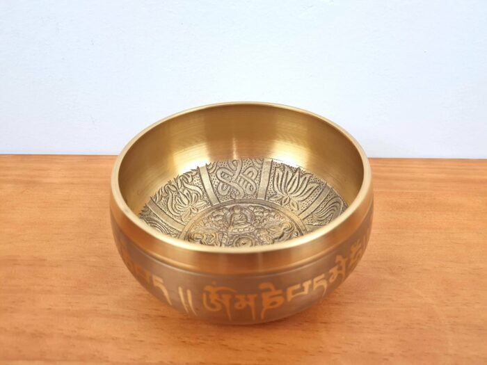 Tigela tibetana com 7 ligas de metal 14cm dourada de Buda