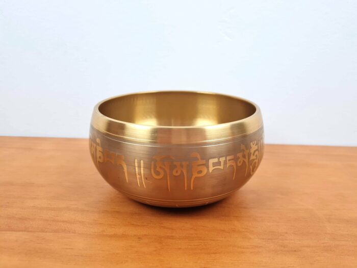 Tigela tibetana com 7 ligas de metal 14cm dourada de Buda