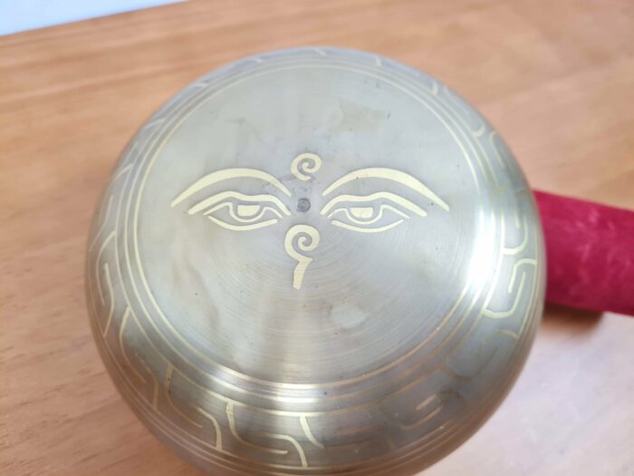 Tigela tibetana com 7 ligas de metal 14cm dourada de Buda