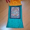 Pinturas tradicionais tibetanas que representam deidades, ensinamentos e imagens abençoadas. Roda Vida