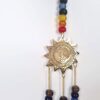 Sino dos ventos de metal com símbolo de Surya Sun e 7 chakras