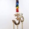 Sino dos ventos de metal com símbolo do Om e 7 chakras