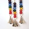 Sino dos ventos de metal com símbolo do Om e 7 chakras