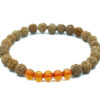 Pulseira de Rudraksha verdadeira, tamanho 7mm, com pedras de Ambar. Peça feita artesanalmente, com ritual de purificação. Tamanho P