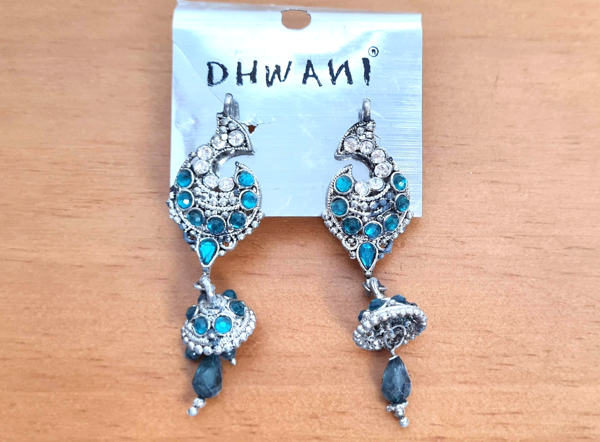 rinco indiano design de pavão com sino e guizos azuis