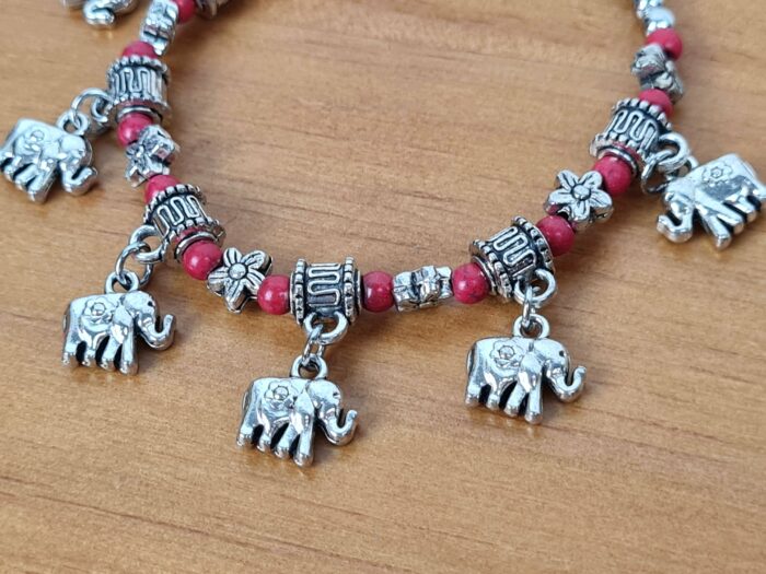 Pulseira de prata alemã com elefantinhos e contas vermelhas