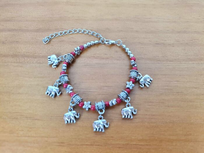 Pulseira de prata alemã com elefantinhos e contas vermelhas