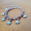 Pulseira de prata alemã com elefantinhos e contas vermelhas