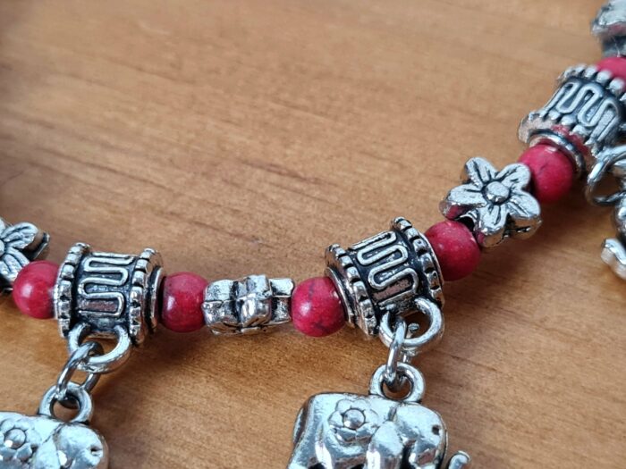 Pulseira de prata alemã com elefantinhos e contas vermelhas