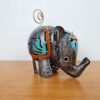 20240423_161952 Elefante decorativo de latão pintado a mão 10cm turquesa e laranja