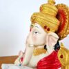Estátua de Deus Ganesha lendo colorida 23cm