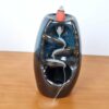 20241017_225327 Incensário cascata de porcelana azul 14cm
