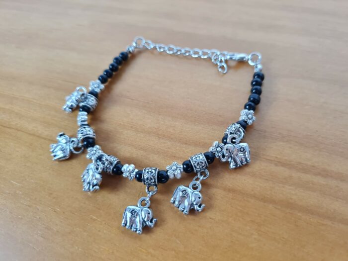 Pulseira de prata alemã com elefantinhos e contas pretas