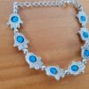 Pulseira de prata alemã de Hamsa com berloques azuis