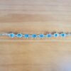 Pulseira de prata alemã de Hamsa com berloques azuis