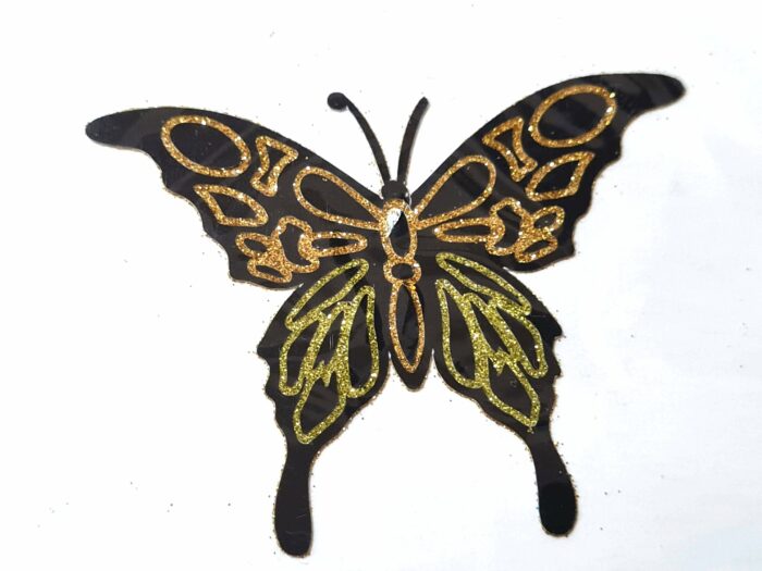tatuagem indiana de borboleta com glitter laranja e amarelo