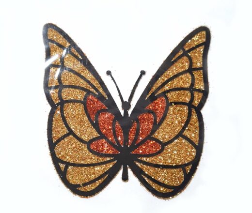 tatuagem indiana de borboleta com glitter dourada e laranja
