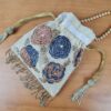 Bolsa Clutch Pouch Indiana com pedrarias florais bege e color