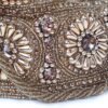 20250918_210507 Bolsa Clutch Pouch Indiana luxo com pedrarias bordadas dourada