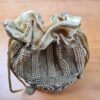 20250918_210555 Bolsa Clutch Pouch Indiana luxo com pedrarias bordadas dourada