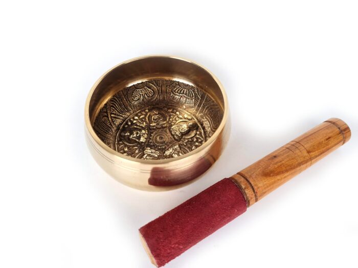 tigela tibetana dourada de Buda com bastao