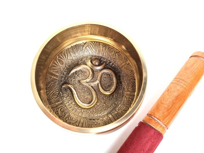Tigela tibetana com 7 ligas dourada símbolo OM 10,5cm