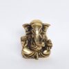 Estátua pequena de Deus Ganesha em metal (Vighnaharta): O removedor de obstáculos.