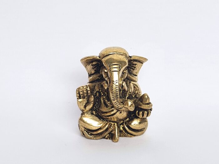 Estátua pequena de Deus Ganesha em metal (Vighnaharta): O removedor de obstáculos.