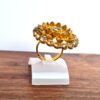Anel indiano de festa dourado design floral com pedras âmbar