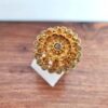 Anel indiano de festa dourado design floral com pedras âmbar