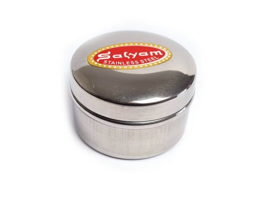 Pote para kumkum ou tilakas, de inox -  um pequeno recipiente de aço inoxidável usado para guardar o pó sagrado vermelho (kumkum ou sindoor) utilizado em rituais hindus, altares (pujas) ou uso pessoal.